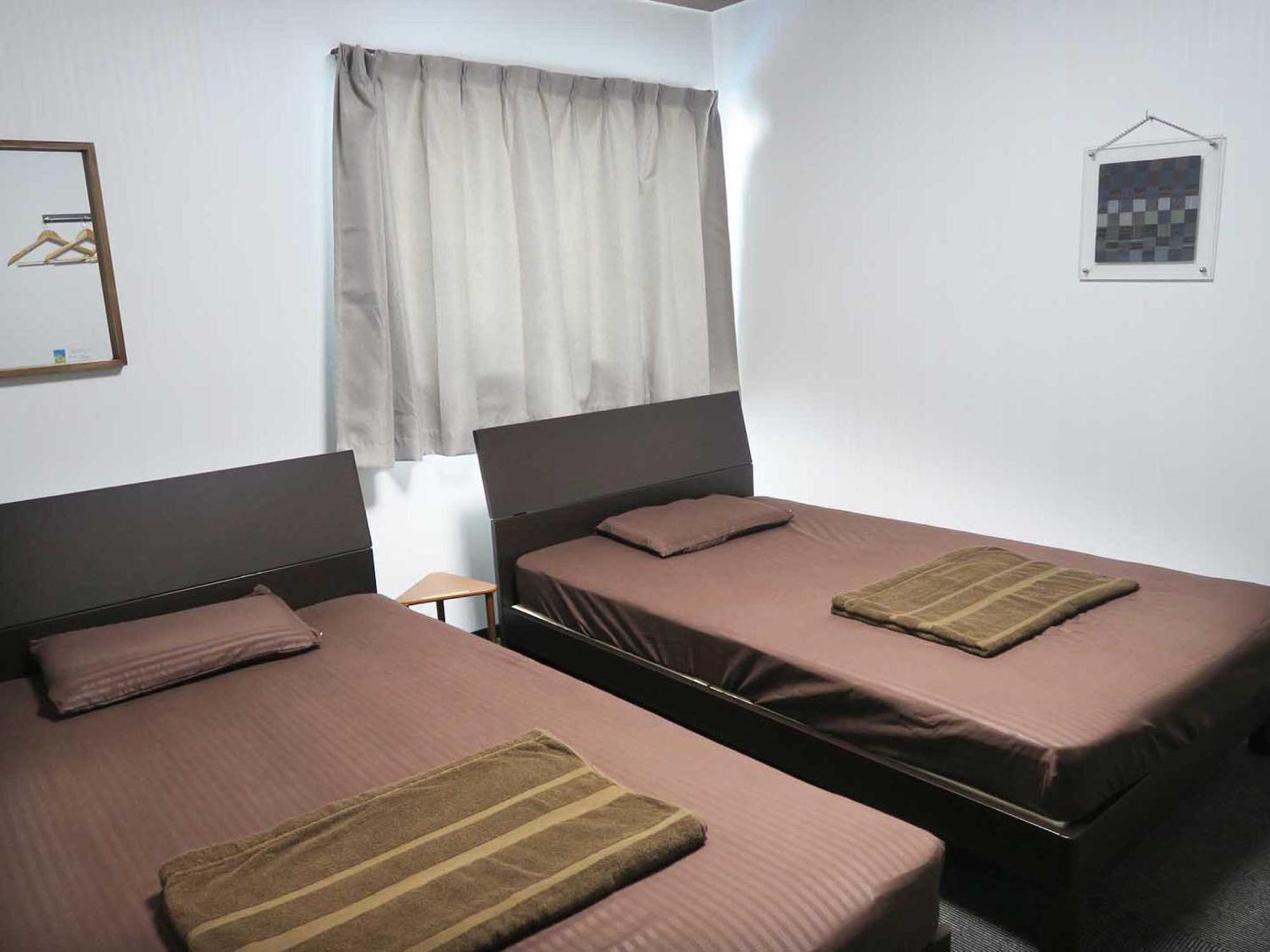 Guesthouse Ama Terrace Amami Værelse billede
